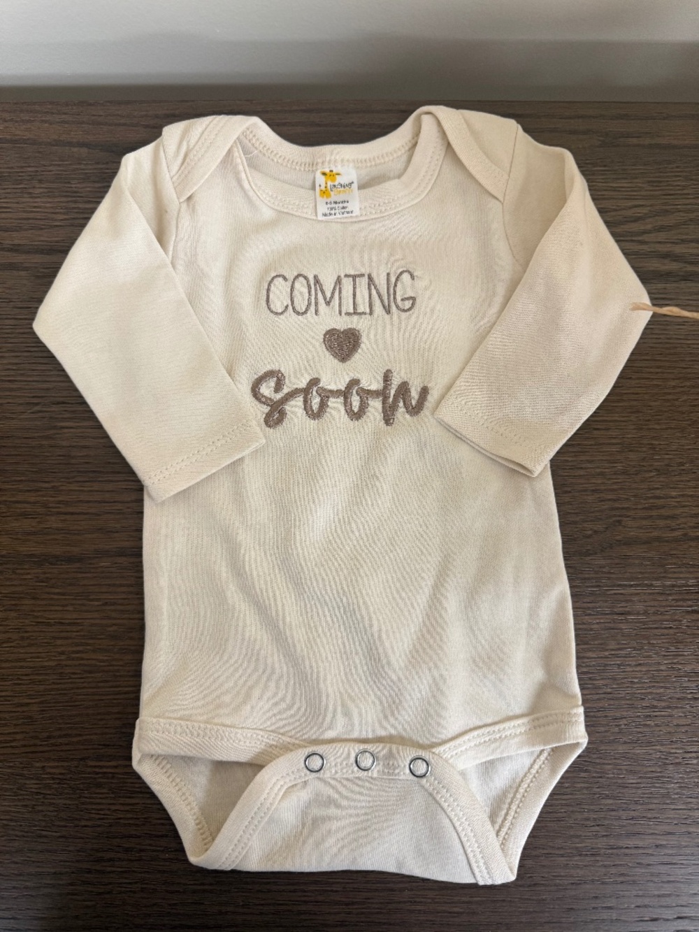 Baby announcement onesie